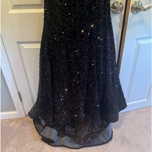 Strapless black sequined prom dress.  Never worn paid $300 asking $150.  Size 8